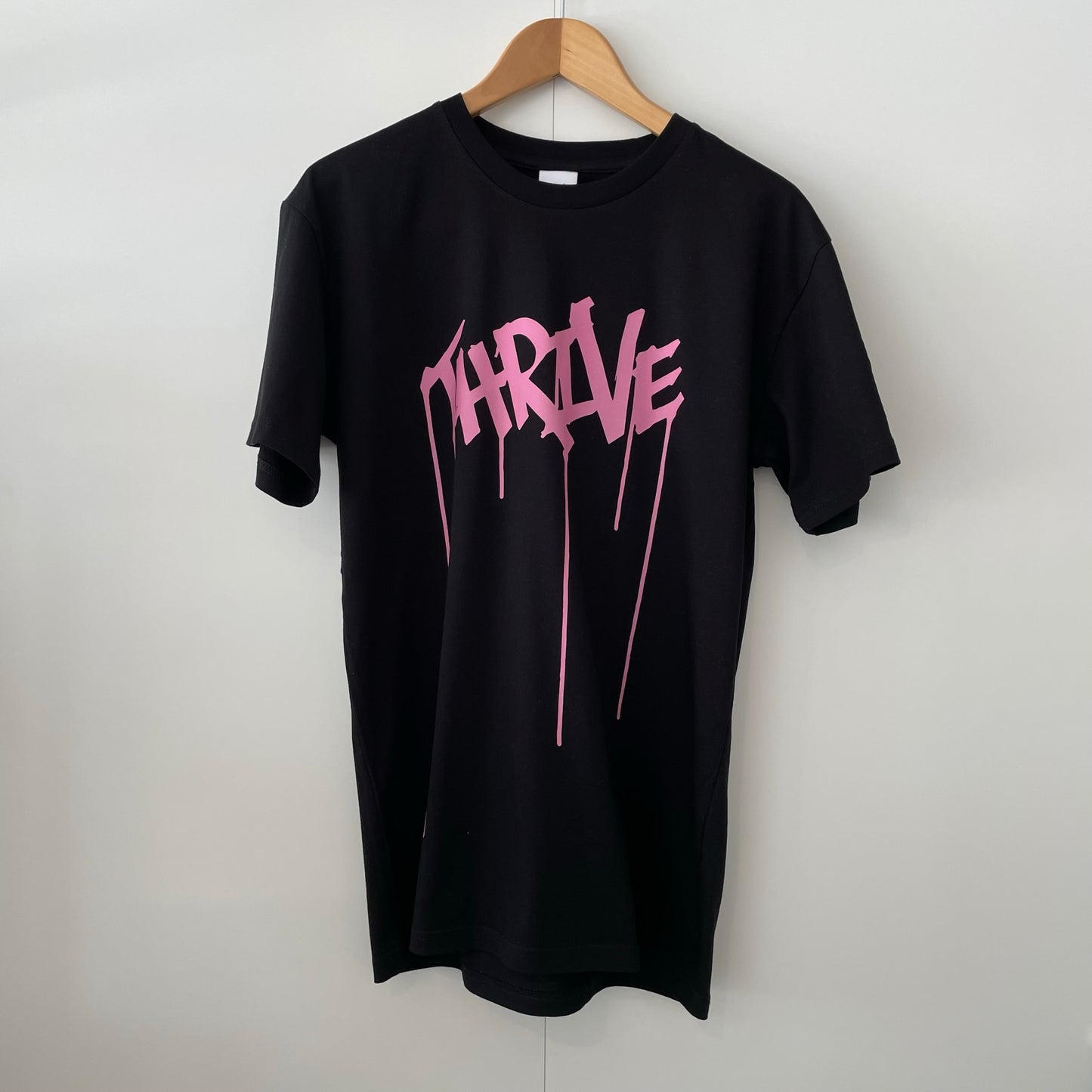 Thrive pink on black